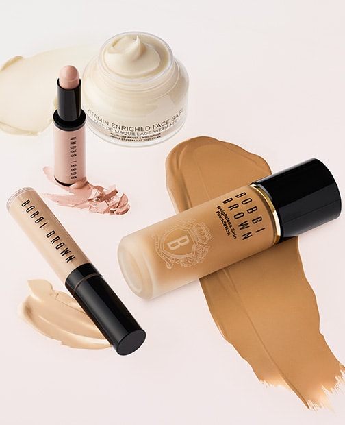 Visual of foundation, highlighter, long-wear cream shadow stick and vitamin enriched face base